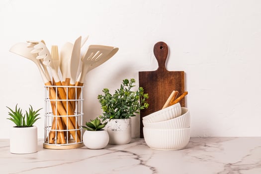 Stylish kitchen background with kitchen utensils on marble white countertop. Front view. minimalism. photo