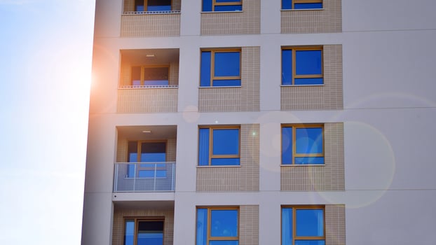 Modern architecture of urban residential apartment building. Apartment building exterior, residential house facade. photo