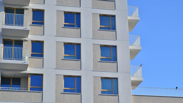 Modern architecture of urban residential apartment building. Apartment building exterior, residential house facade. photo