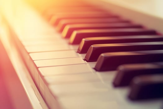 AI generated Side view of piano keys in soft pastel colors. Generative AI photo
