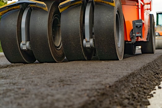 large roller wheels are made for sealing and leveling the ground, road surfaces. Close-up photo