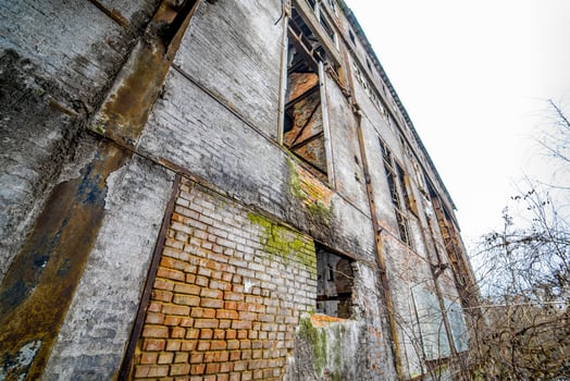 Abandoned industrial building. Ruins of an old factory photo