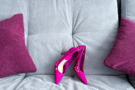 Bride's wedding shoes. Selective focus. Purple color. Wedding concept. Closeup. photo