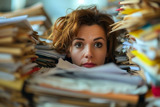 AI Generated Caucasian woman in an office, overwhelmed by a mountains of paperwork photo