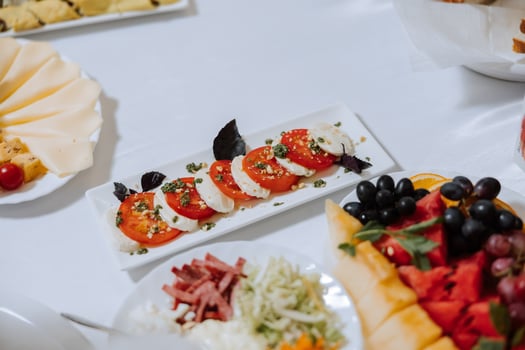 Top view of a beautifully decorated table with delicious food. Everything is ready for lunch or dinner with delicious snacks and a cozy atmosphere. photo