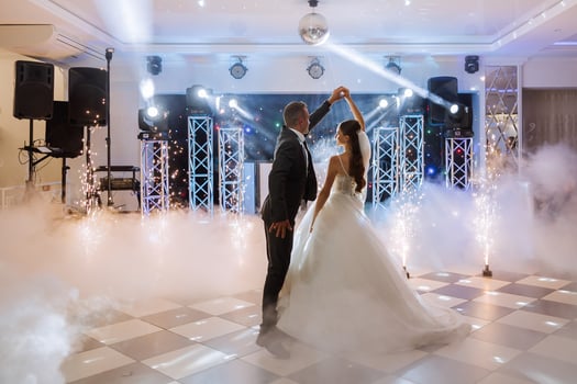 the wedding of the bride and groom in an elegant restaurant with great light and atmosphere. The first dance of the bride and groom. photo