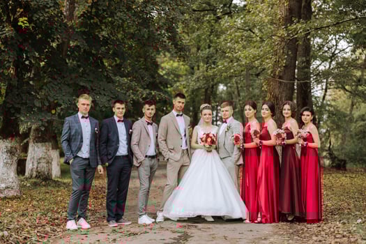 Wedding photo session in nature. The bride and groom and their friends