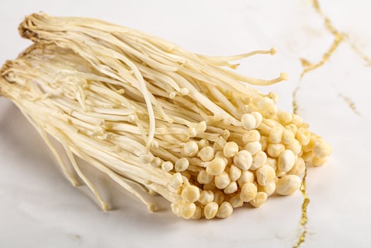 Tasty raw enoki mushroom heap photo