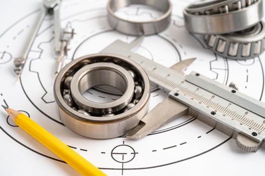 Engineering tools and mechanical industrial with vernier caliper and metal ball bering. photo