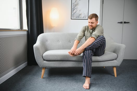Man's legs have symptoms Itchy feet caused by fungi. photo