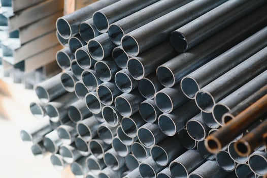 Aluminium profile for windows and doors manufacturing. Structural metal aluminium shapes. Aluminium profiles texture. Aluminium constructions factory photo