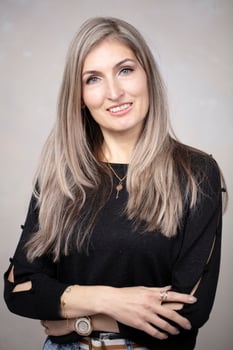 Beautiful middle-aged woman of European type posing and looking at the camera. photo