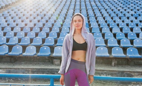 Portrait of a beautiful Caucasian girl athlete in the morning run photo