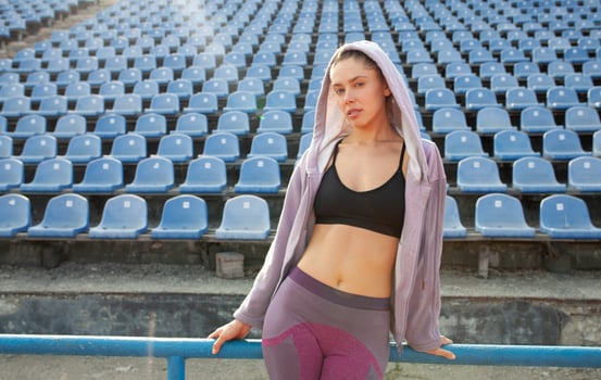 Portrait of a beautiful Caucasian girl athlete in the morning run photo