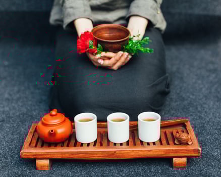 Chinese tea ceremony Asian wooden table board chaban top view copy space morning energy. photo