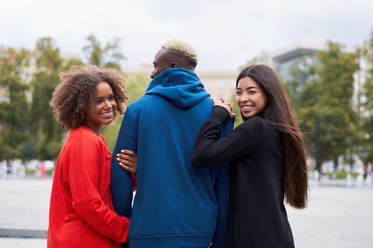 Multi ethnic friends outdoor. Diverse group people Afro american asian spending time together photo