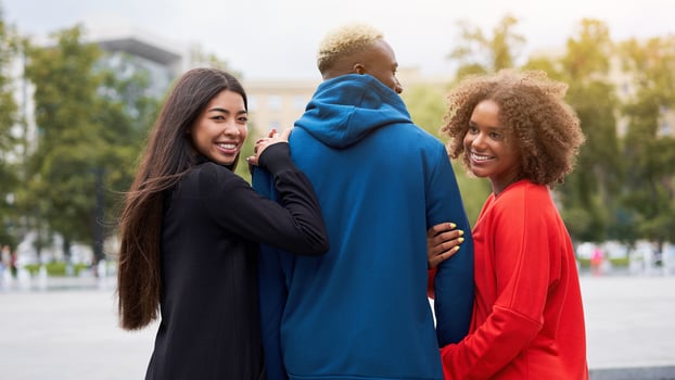 Multi ethnic friends outdoor. Diverse group people Afro american asian spending time together photo