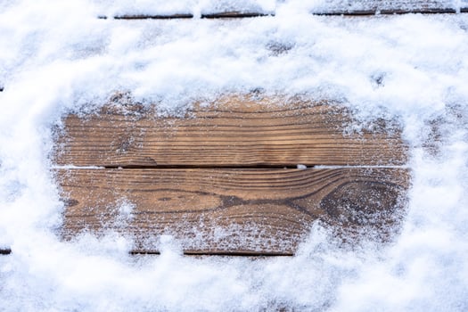 Winter background. Empty wooden plank with snow border, copy space for text photo