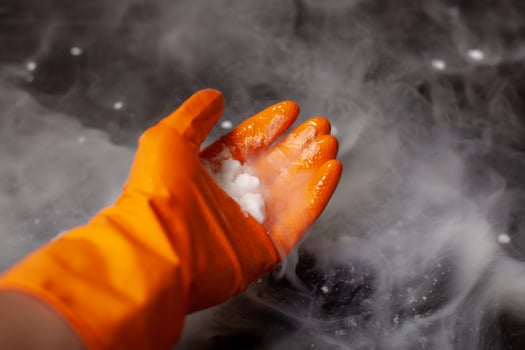Thick white smoke on a background of black ceramic tiles. photo