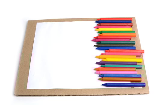 Crayons lined up isolated on white background. photo
