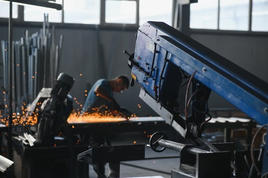 Factory worker measures the metal profile photo