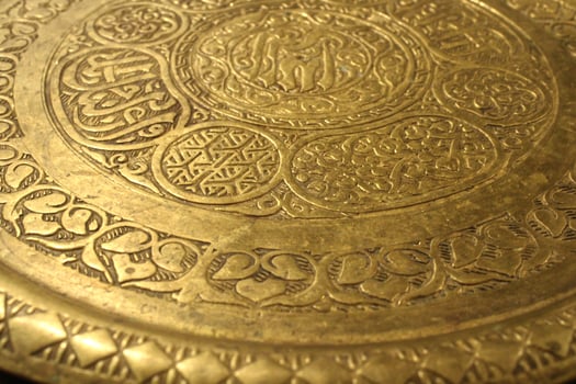 old oriental metal plate, golden plate photo