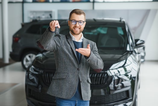 Man adult customer male buyer client wears classic suit white shirt chooses auto photo
