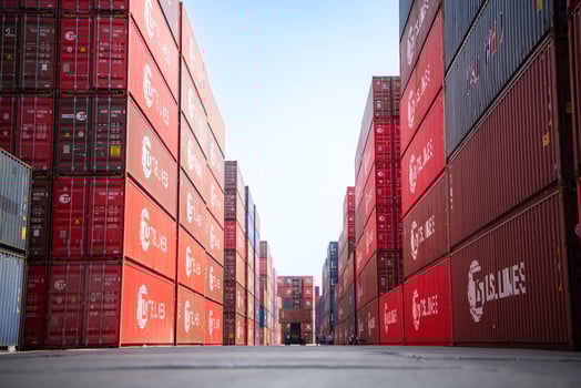 Containers stacked in a freight terminal at the port of Bangkok, Thailand photo