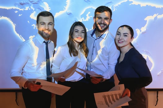 Group of business people smiling on camera. Fron View photo