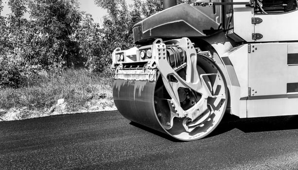 Close view of drum roller at the construction site, working on the new road photo