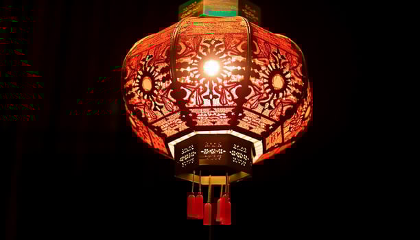 AI generated Chinese lanterns hanging in the night, glowing symbols of celebration generated by AI photo