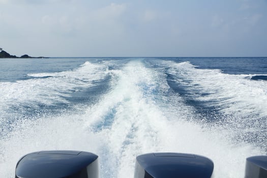 Waves of speed boat on the sea. photo