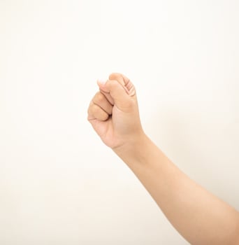 Hand pointing at something and make a sign on white background photo