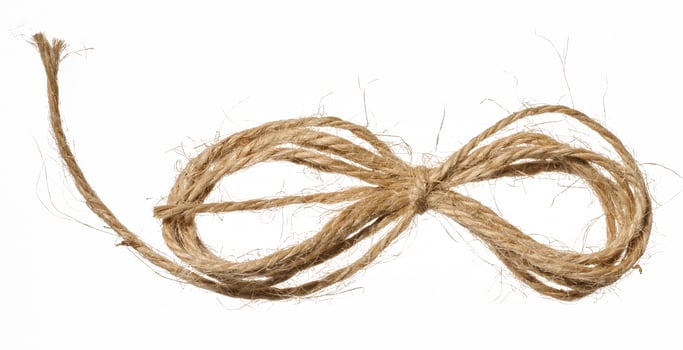Knotted brown jute rope bow, wrapping material photo