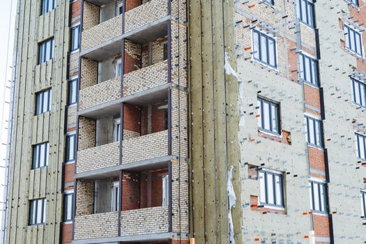 Home renovation, mineral wool insulation close-up. Protection of the building from the cold, thermal insulation, construction work. photo