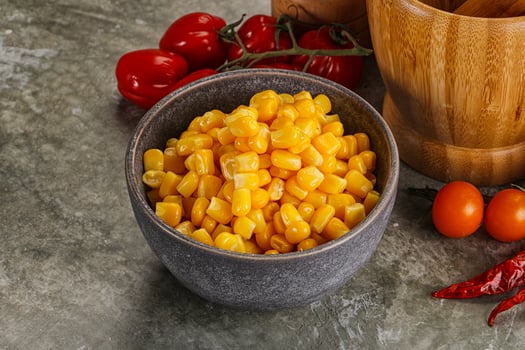 Sweet canned ripe corn grain photo
