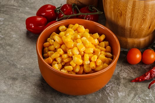 Sweet canned ripe corn grain photo