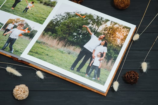 premium photo book, large size, natural wood cover, quality binding. Family photobook, recreation memories