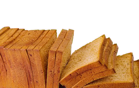 close up of white sliced toast bread on white photo