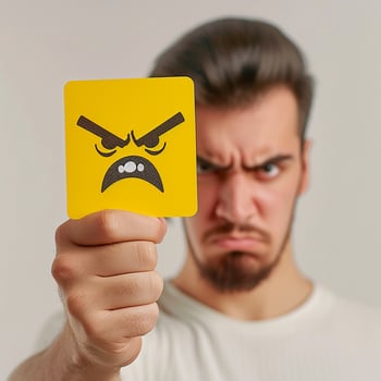 AI generated man holding card with angry emoji. emotion photo