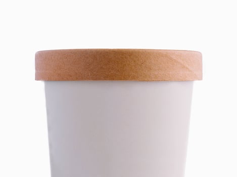 Ice Cream in paper cup on White Background photo