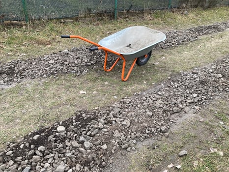 Construction of road filling with gravel photo