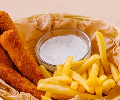 Fried chicken nuggets with french fries photo