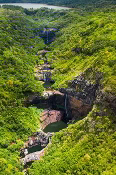 Aerial view from above of the Tamarin waterfall seven cascades in the tropical jungles of the island of Mauritius photo