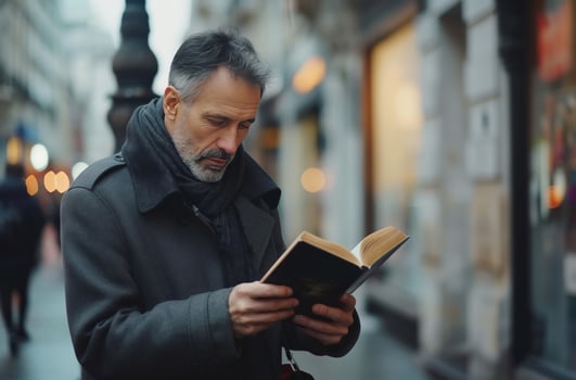 AI generated Man engrossed in book outdoors photo