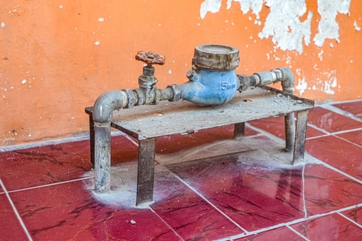 an ancient water meter in Indonesiaq photo