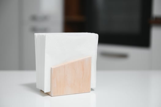 Wooden napkin holder in kitchen photo