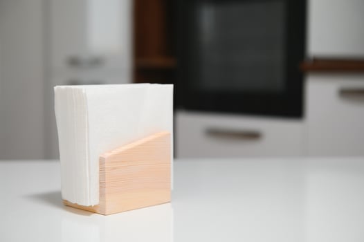 Wooden napkin holder in kitchen photo