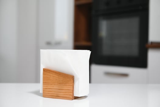 Wooden napkin holder in kitchen photo