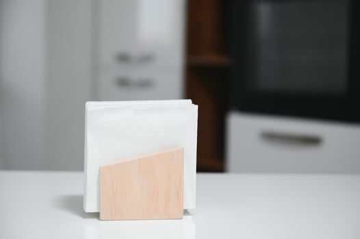 Wooden napkin holder in kitchen photo